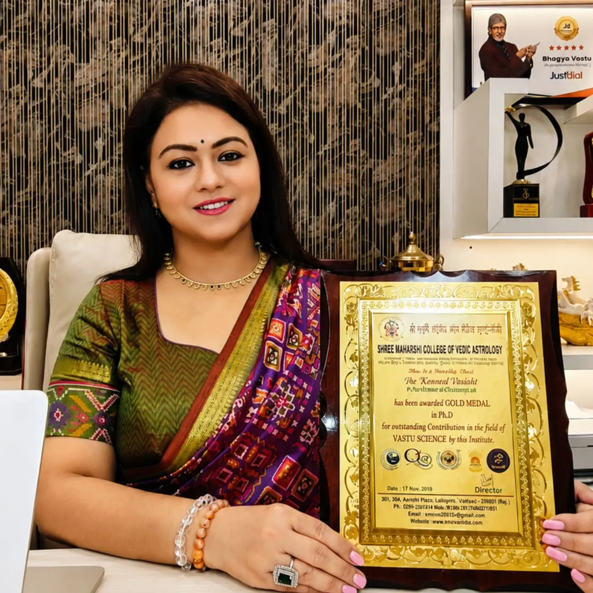 Dr. Kkomal Vasisht with academic and professional credentials